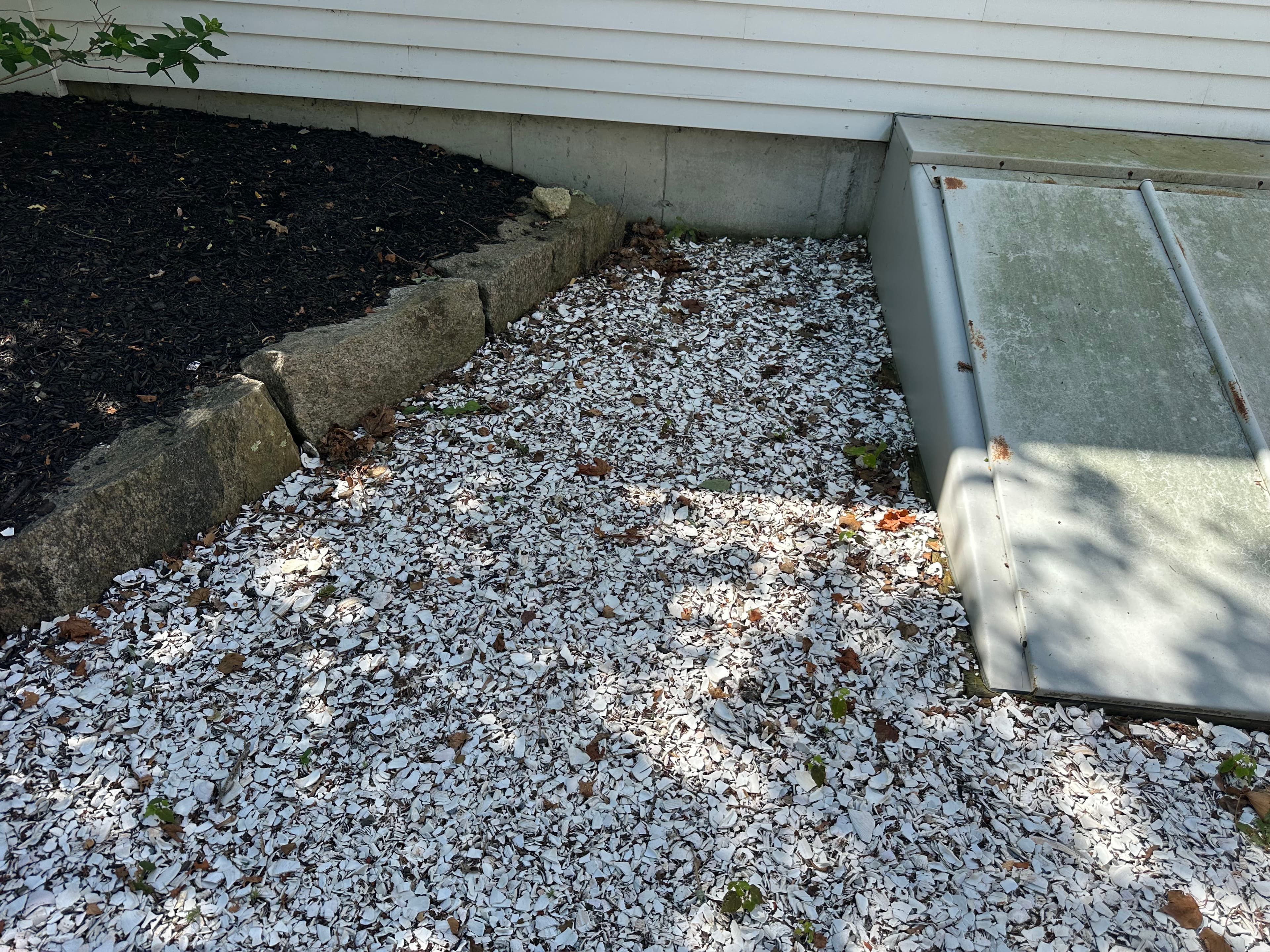 Project Landscape Bed Rebuild with Boulder Borders, Metal Edging, and Fresh Mulch image