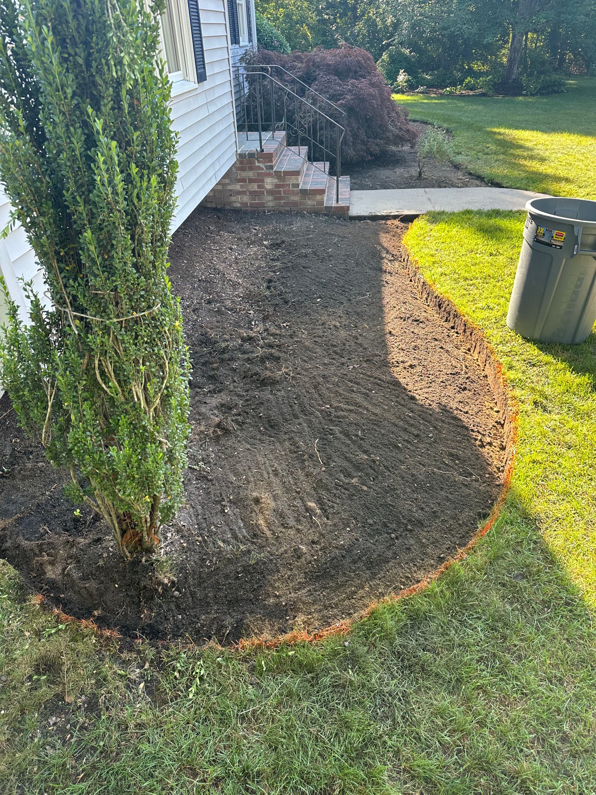 Gallery photos for Black Mulch Bed Design With Fresh Perennial Plantings: Image #1